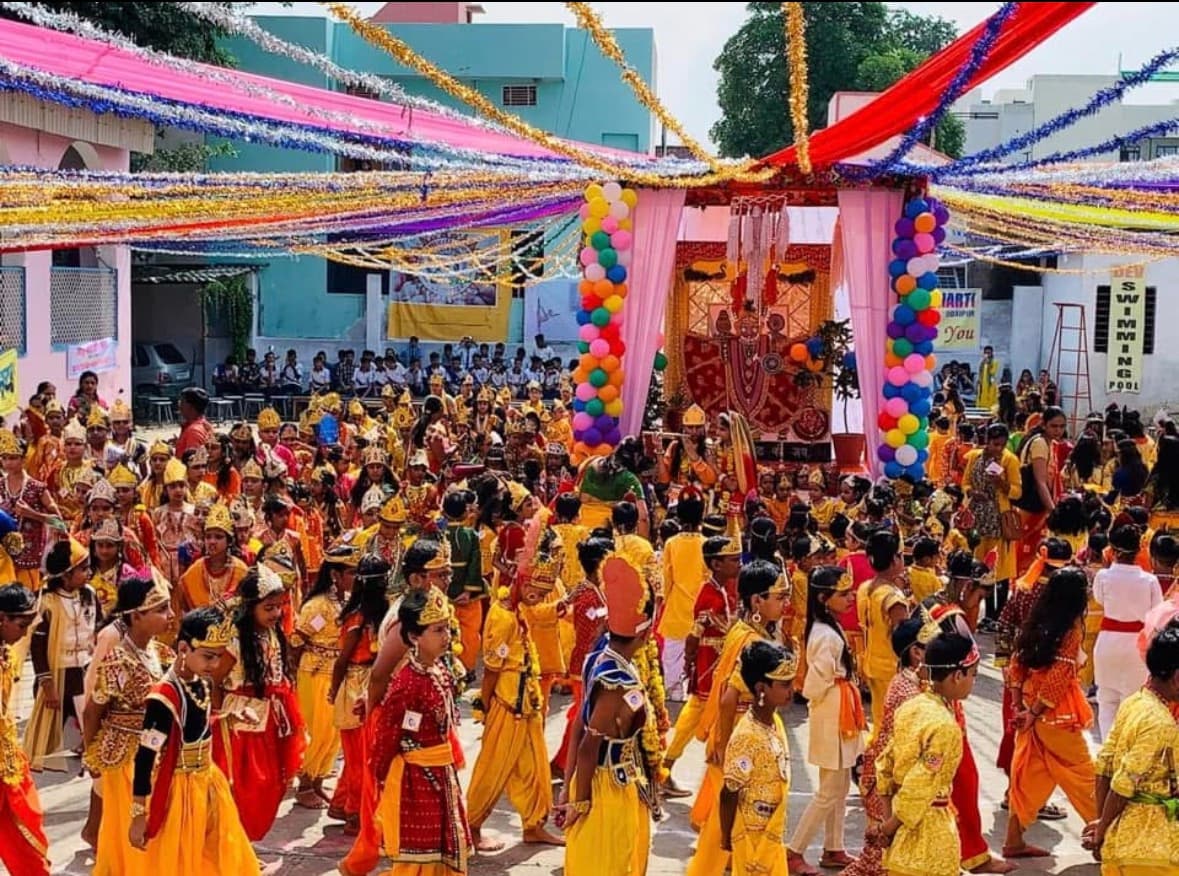 Children participating in a school event, dressed up for a play