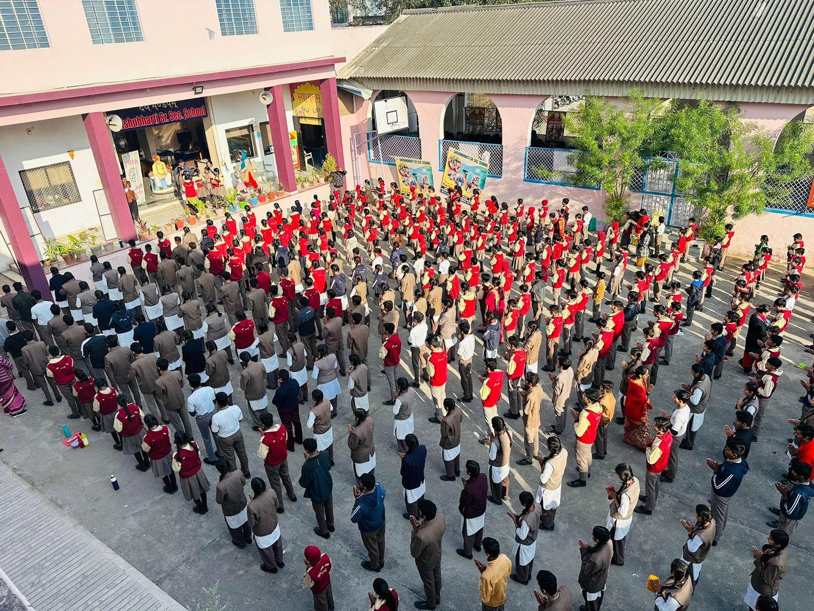Students lined up in uniform, possibly for assembly